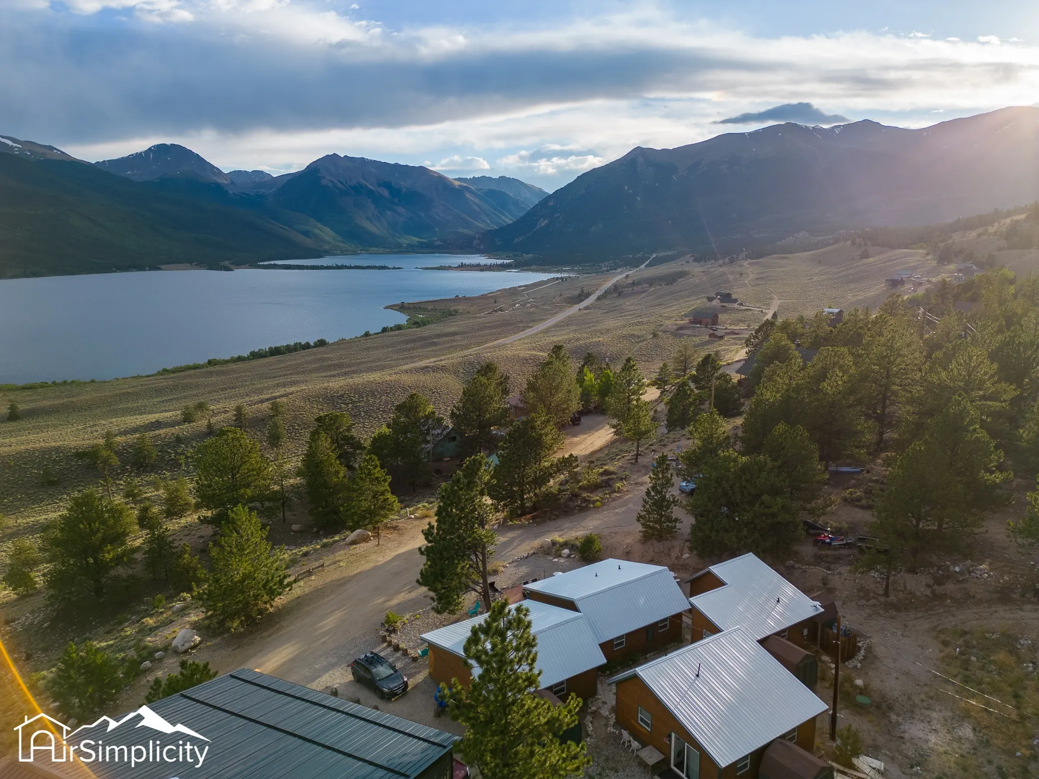 Aerial view of a Colorado mountain lake from one of our STRs